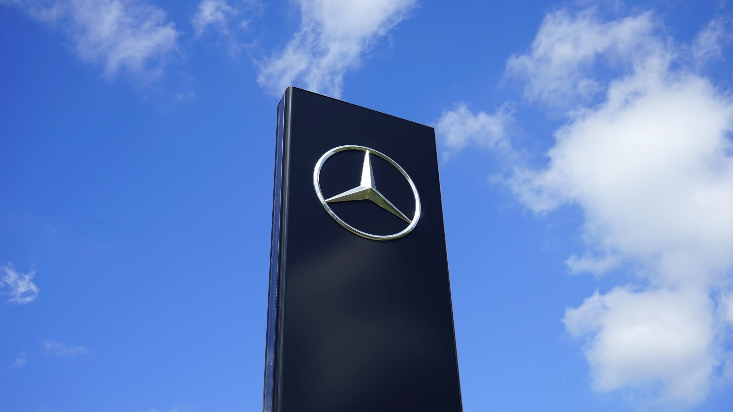 The Mercedes-Benz logo is known for its metallic colour, but is just as easily noted in black and white
